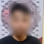 E, tersangka kasus narkotika yang ditangkap di Lere, Palu, Kamis (5/6/2025). (Foto: Humas Polresta Palu)